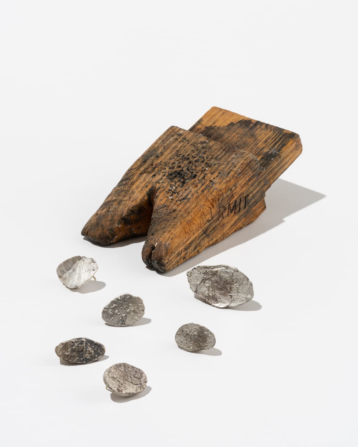 Piece of wood and stones